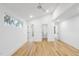 Bright bedroom with hardwood floors and ample closet space at 2708 A Ashley St, Durham, NC 27704