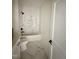 Bathroom featuring shower and tub combo, decorative tiling, and modern fixtures at 2817 Silk Hope Gum Springs Rd, Pittsboro, NC 27312