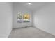 Cozy bedroom with large window offering natural light and relaxing views at 5300 Pulley Town Rd, Zebulon, NC 27597