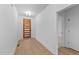 Welcoming foyer with hardwood floors, recessed lighting, and stylish front door at 5300 Pulley Town Rd, Zebulon, NC 27597