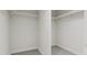 Two spacious reach-in closets with white shelves at 940 Myers Point Dr # 36, Morrisville, NC 27560