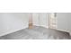 This bedroom has neutral walls and carpet, with a view of the bathroom at 119 Augusta Pond Way # 147, Raleigh, NC 27603
