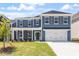 Charming two-story home with a manicured lawn and a two-car garage, perfect for Gathering living at 119 Augusta Pond Way # 147, Raleigh, NC 27603