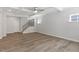 Spacious living room featuring hardwood floors, a staircase, and recessed lighting at 119 Augusta Pond Way # 147, Raleigh, NC 27603
