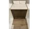 Kitchen features white quartz countertops and brown cabinets at 207 Chesapeake Commons Street # 80, Garner, NC 27529
