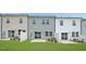 Townhome backyard featuring a lawn, patio, and fences at 289 Hank Way, Angier, NC 27501