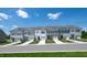 Beautiful townhome exteriors feature varied colors, landscaping, garages, and inviting curb appeal at 289 Hank Way, Angier, NC 27501