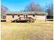 Brick ranch house with deck and spacious backyard at 515 Cody St, Roxboro, NC 27573