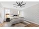 Beautifully designed bedroom with a ceiling fan and natural lighting at 100 Firefly Ln, Louisburg, NC 27549