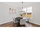 Cozy dining area with natural light and views of the expansive outdoor landscape at 100 Firefly Ln, Louisburg, NC 27549