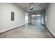 This two car garage features gray epoxy flooring, a side entry door, and plenty of room for storage at 100 Firefly Ln, Louisburg, NC 27549