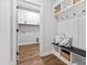 Inviting mudroom entry with custom bench and ample storage and laundry hookups at 100 Firefly Ln, Louisburg, NC 27549