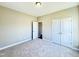 Inviting bedroom with a closet and access to another room, offering convenience and space at 21 Oakbridge Way, Pikeville, NC 27863