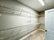 Bright walk-in closet with multiple shelves, ensuring plenty of storage space at 21 Oakbridge Way, Pikeville, NC 27863