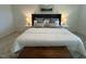 Serene bedroom features a comfortable bed, soft lighting, and cozy decor, providing a relaxing retreat at 235 Chestnut Oak Ln, Lillington, NC 27546