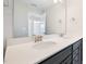 Bathroom with a double sink vanity, granite countertop, and a large mirror at 103 W Star Foal Ln, Wendell, NC 27591