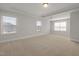 New bedroom features neutral walls, carpet, and large windows at 103 W Star Foal Ln, Wendell, NC 27591