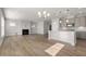 The kitchen is open to the living room with fireplace at 103 W Star Foal Ln, Wendell, NC 27591