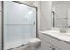 Bathroom featuring a glass enclosed shower and a single sink vanity at 22 Belmont Stakes Ln, Wendell, NC 27591