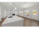 Bright living space with a fireplace, wood floors and an eat-in kitchen at 22 Belmont Stakes Ln, Wendell, NC 27591