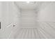 Walk-in closet with wire shelving and carpet at 22 Belmont Stakes Ln, Wendell, NC 27591