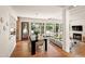 Modern dining area with large windows and hardwood floors at 4416 Arrowhead Trl, Hillsborough, NC 27278