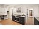 Modern kitchen with stainless steel appliances and a spacious layout at 4416 Arrowhead Trl, Hillsborough, NC 27278