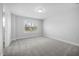 Neutral bedroom with carpet, a window and a closet at 75 E Star Foal Ln, Wendell, NC 27591
