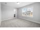 Bedroom featuring neutral carpet and closet at 75 E Star Foal Ln, Wendell, NC 27591