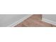 Detailed view of wood flooring and crisp white trim at 75 E Star Foal Ln, Wendell, NC 27591