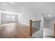Open living space featuring wood floors and natural light at 75 E Star Foal Ln, Wendell, NC 27591
