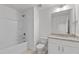 Bathroom with single vanity, granite countertop, shower-tub combo, and toilet at 953 Alma Railway Dr, Wake Forest, NC 27587