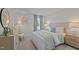 Beautiful bedroom with blue accents, wicker bed frame, and natural light at 959 Alma Railway Dr, Wake Forest, NC 27587