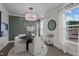Well-appointed dining room with stylish light fixture and elegant decor at 959 Alma Railway Dr, Wake Forest, NC 27587