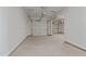 Spacious two car garage featuring concrete floors, neutral paint, and overhead door openers at 959 Alma Railway Dr, Wake Forest, NC 27587