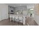 Beautiful kitchen featuring a large island, modern gray cabinetry, and stainless steel appliances at 959 Alma Railway Dr, Wake Forest, NC 27587