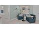 Comfortable sitting area with stylish chairs, ambient lighting, and elegant wall decor at 959 Alma Railway Dr, Wake Forest, NC 27587