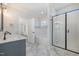 Bathroom features a glass enclosed shower and a soaking tub with subway tile surround at 649 Riverwood Dr, Clayton, NC 27527
