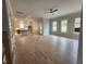 Bright and airy open floor plan, hardwood floors, neutral paint, seamlessly connecting living spaces at 649 Riverwood Dr, Clayton, NC 27527