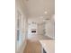 Bright living room featuring a fireplace, built in cabinets and shelves, and hardwood floors at 649 Riverwood Dr, Clayton, NC 27527