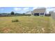 Large grassy backyard with privacy fence at 71 Nolan Ct, Lillington, NC 27546