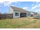Spacious backyard with screened porch and trampoline at 71 Nolan Ct, Lillington, NC 27546