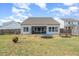 Large backyard with patio, trampoline and picnic table at 71 Nolan Ct, Lillington, NC 27546