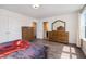 Bright bedroom with wood dresser and double door closet at 71 Nolan Ct, Lillington, NC 27546