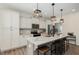 Large kitchen island with seating and plenty of cabinet space at 71 Nolan Ct, Lillington, NC 27546