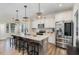 Modern kitchen with granite countertops and stainless steel appliances at 71 Nolan Ct, Lillington, NC 27546