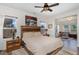 Spacious main bedroom with a large bed and en-suite bathroom at 71 Nolan Ct, Lillington, NC 27546