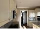An unfinished kitchen featuring modern stainless steel appliances and white cabinetry at 981 Olive Branch Dr, Smithfield, NC 27577