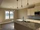 Bright and spacious kitchen featuring modern stainless steel appliances and a central island with a sink at 981 Olive Branch Dr, Smithfield, NC 27577