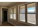 A sun-drenched room with large windows offering serene views of the surrounding landscape at 981 Olive Branch Dr, Smithfield, NC 27577
